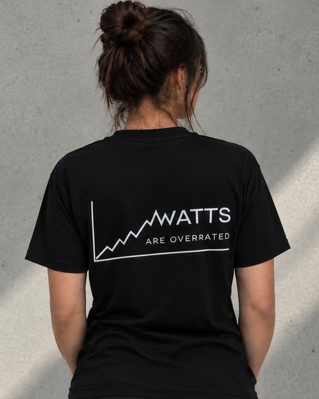 The black tee, back view, a rising chart line that turns into the word WATTS